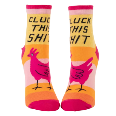 Bright horizontal wide stipes with a pink rooster on the front part with writing "cluck this shit" on ankle socks