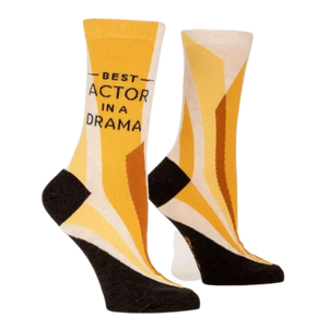 BEST ACTOR IN A DRAMA CREW SOCKS. Lots of gold shades with writing "BEST ACTOR IN A DRAMA"