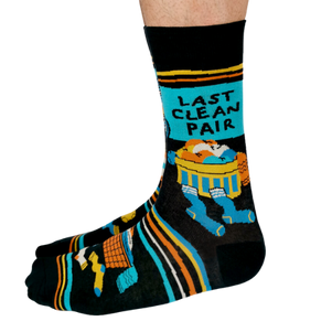 A pair of men’s socks in a clean, minimalist design. The socks are solid white with subtle ribbed detailing along the cuff for a snug fit. Made from soft, breathable cotton, these mid-calf socks offer a crisp, fresh look, ideal for everyday wear or pairing with formal shoes. The simplicity of the design emphasizes cleanliness and comfort, perfect for men who prefer a classic, no-frills style.