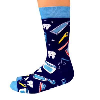 Best Gift for your Dentist. Teeth and dentist tools are in an all over pattern with dark blue back ground. Women's Socks