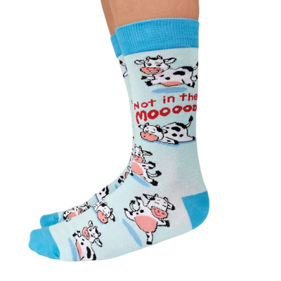 MOODY COW SOCKS. Not in the mood women's crew socks. Cows in funny positions all over the socks with light blue background.