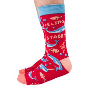 Fish and Narwhal's swimming with red back ground, peach toes, heal and blue top elastic.