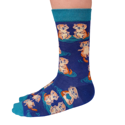 Otterly Adorable Socks by Uptown Sox featuring cute otter designs, perfect for animal lovers looking for cozy and fun socks with a playful twist.