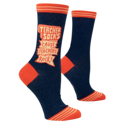 TEACHER SOCKS 'CAUSE TEACHERS ROCK CREW SOCKS NEW 2023 THE SOCK BAR. Dark blue background with orange on toes. heal and top.
